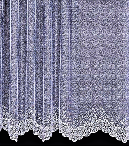 FIRANKA ŻAKARDOWA W KOLORZE BIAŁYM Z GĘSTO NAKRAPIANYM WZOREM I MISTERNIE ZDOBIONYM DOŁEM PRZYPOMINAJĄCYM COTTON BALLS EFEKT FALI WYSOKOŚĆ 180 CM PRODUCENT POLONTEX CZĘSTOCHOWA